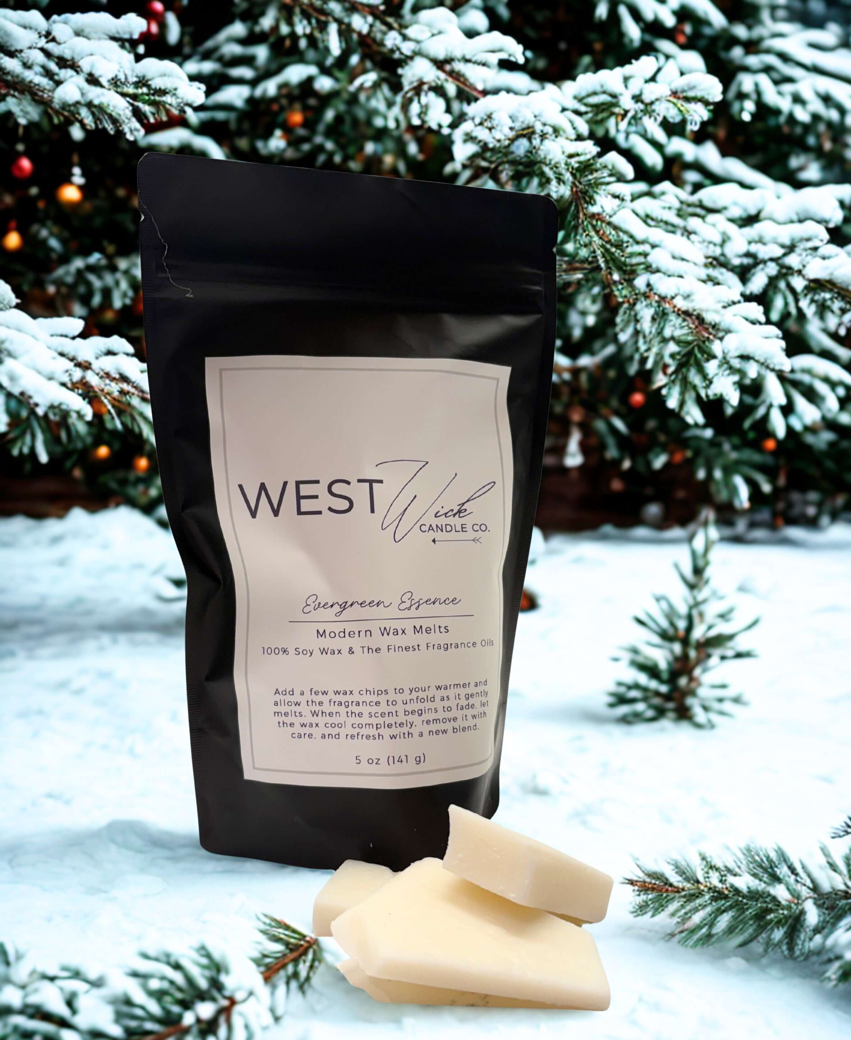 Evergreen Essence Wax Melts by West Wick Candle Co, featuring a festive holiday scent of snowy evergreens and sweet fruits.