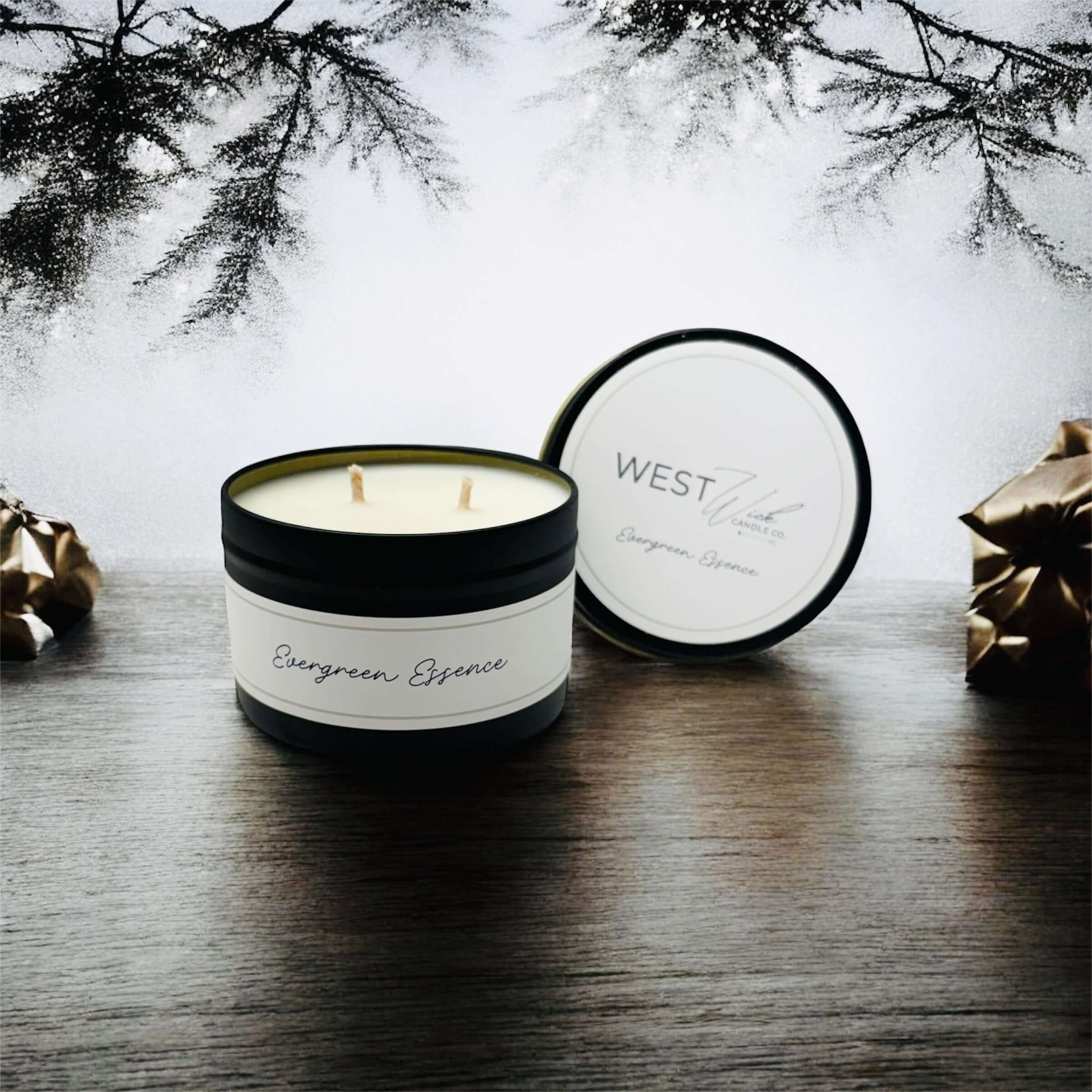 Evergreen Essence - Black Luxe Candle displayed in a cozy winter setting with festive decorations.