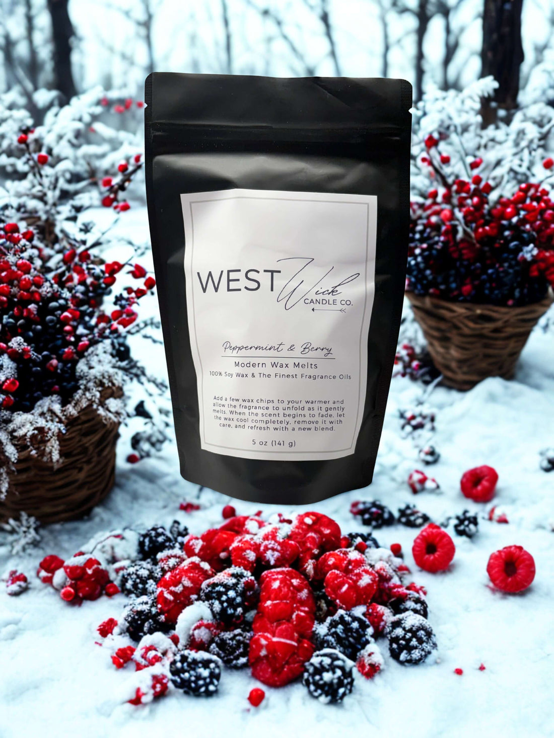 Peppermint &amp; Berry Wax Melts package surrounded by winter berries and snow, enhancing the festive holiday ambiance.